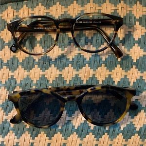 Two pairs of tortoise shell glasses